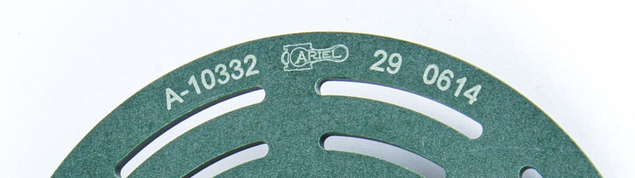 Detail of the Ariel logo on a composite OEM Valve Plate